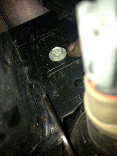To relocate horns, remove this factory bolt above fog light (Figure 15)