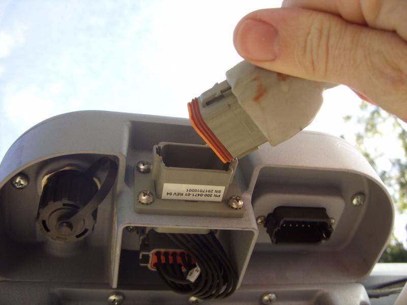 Roof Module 5. Connect the Main cable Harness to the Roof Module connector. See Figure 6-17. 6. Orient the 12-pin connector so the word TOP on the cable connector is pointing upwards (towards the sky).