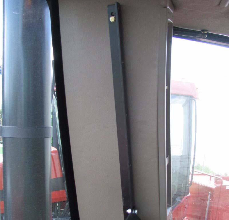 Display Installation 2. Mount the bracket to the cab frame. Note: Use the longer bolts and spacer bushings supplied in the installation kit.