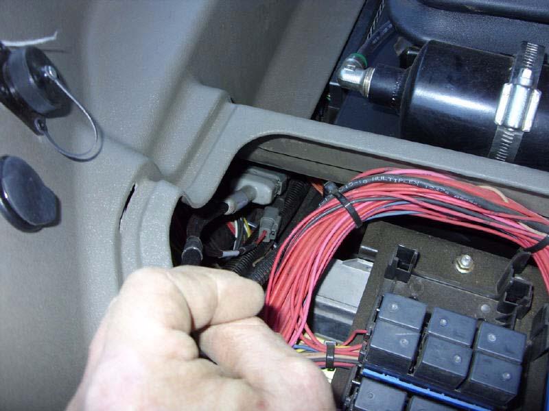Cab Power Connection Cab Power Connection 1. Locate the cab console right-side 12V convenience power outlet. See Figure 6-23. 2.