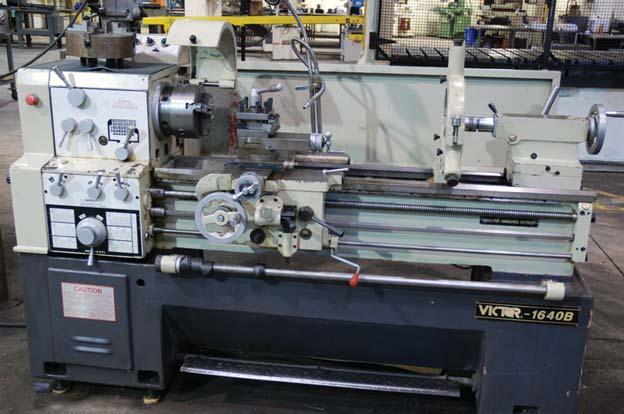 VICTOR 1640 B LATHE 2000 1of4 Saws BOMAR STG-320GM HORIZONTAL BANDSAW PARTIAL VIEW OF NITROGEN CYLINDERS