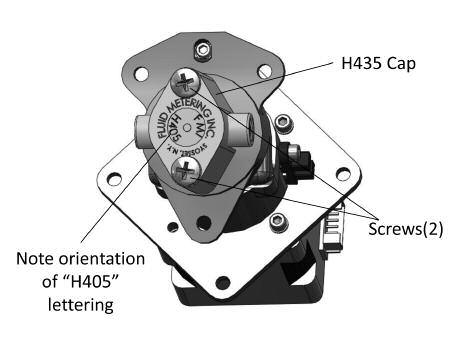 Remove the (2) screws that secure the H435 Cap to the pump base assembly and carefully remove (twist, tilt & pull) the piston/cylinder group from the pump base assembly.