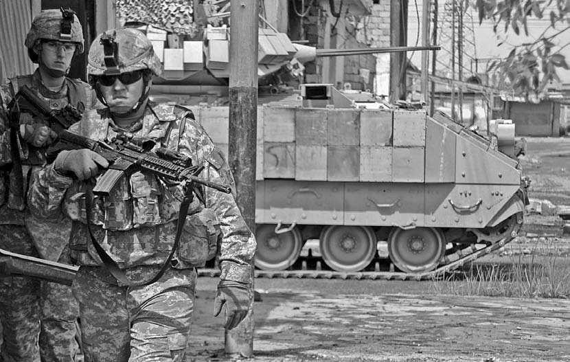Armor and infantry are best kept in close proximity for urban operations. Weapon in foreground is a U.S.