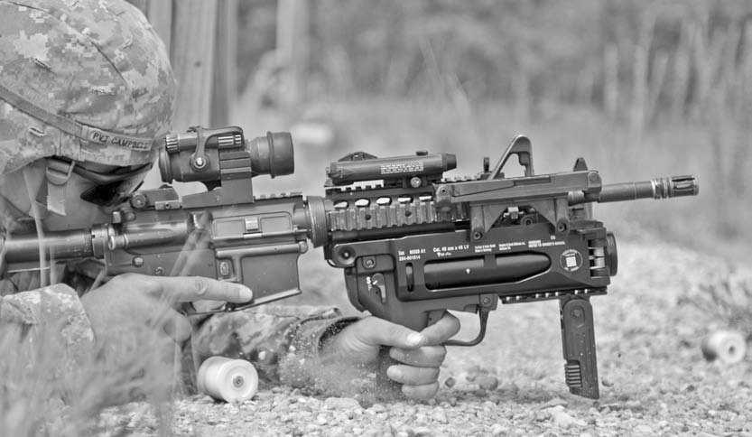 Small Arms for Urban Combat Above: The U.S. M320 40mm grenade launcher, the M203 s replacement.