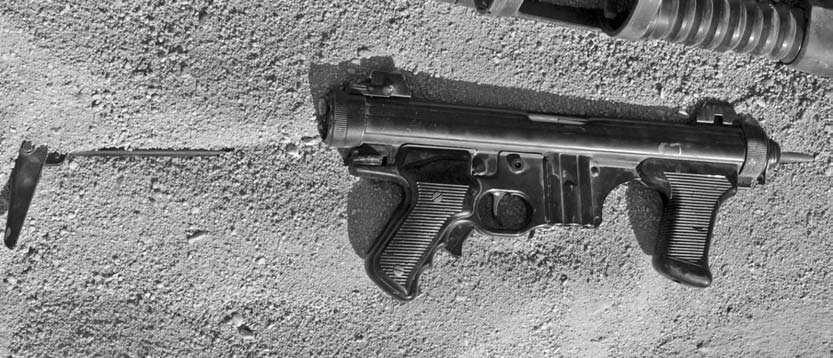 Small Arms for Urban Combat weight was also slightly less at around 6 1 2 pounds empty. This model would be replaced in the 1970s by the model 12S. This was improved in some areas.