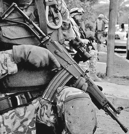 4. Carbines/Rifle Caliber Submachine Guns An Israeli made Galil SAR in 5.56mm, perhaps the finest made AK-47 variation (Sgt. D. Foley, U.S. Army). to do so.