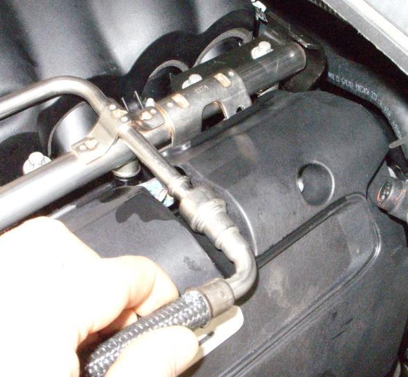 33. Reconnect the fuel line to the