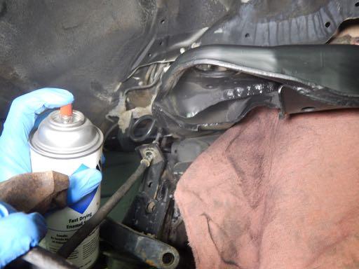 If more of the upper control arm needs to be removed, continue grinding (or cutting) until the