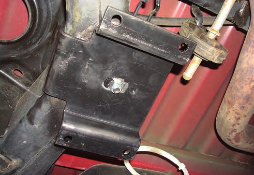 If there is any leftover weld holding the bracket off the frame, remove and grind down so the bracket is flush.
