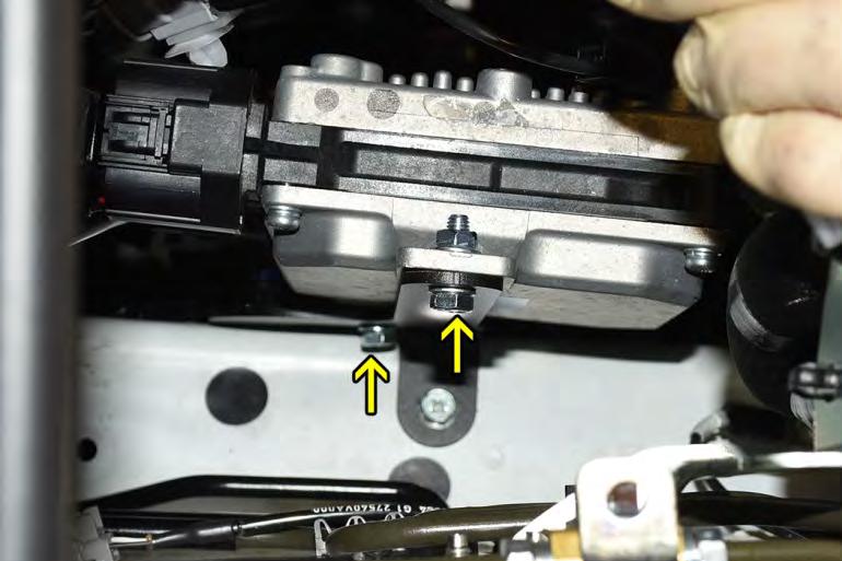 attach the ECU to the relocation bracket as shown.