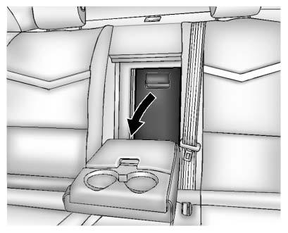 With the vehicle started, press M or L to heat the left or right outboard seat cushion and seatback.