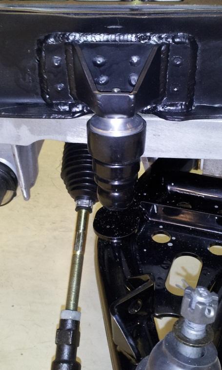 7. Install lower control arm assemblies. a) Install the correct lower control arm (driver or passenger side).