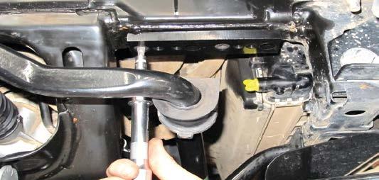 This kit is intended to increase clearance between sway bar and strut spring seat. Fig 2 1.