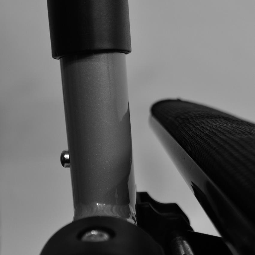 black handle on the seat plate  9) The Rollator can