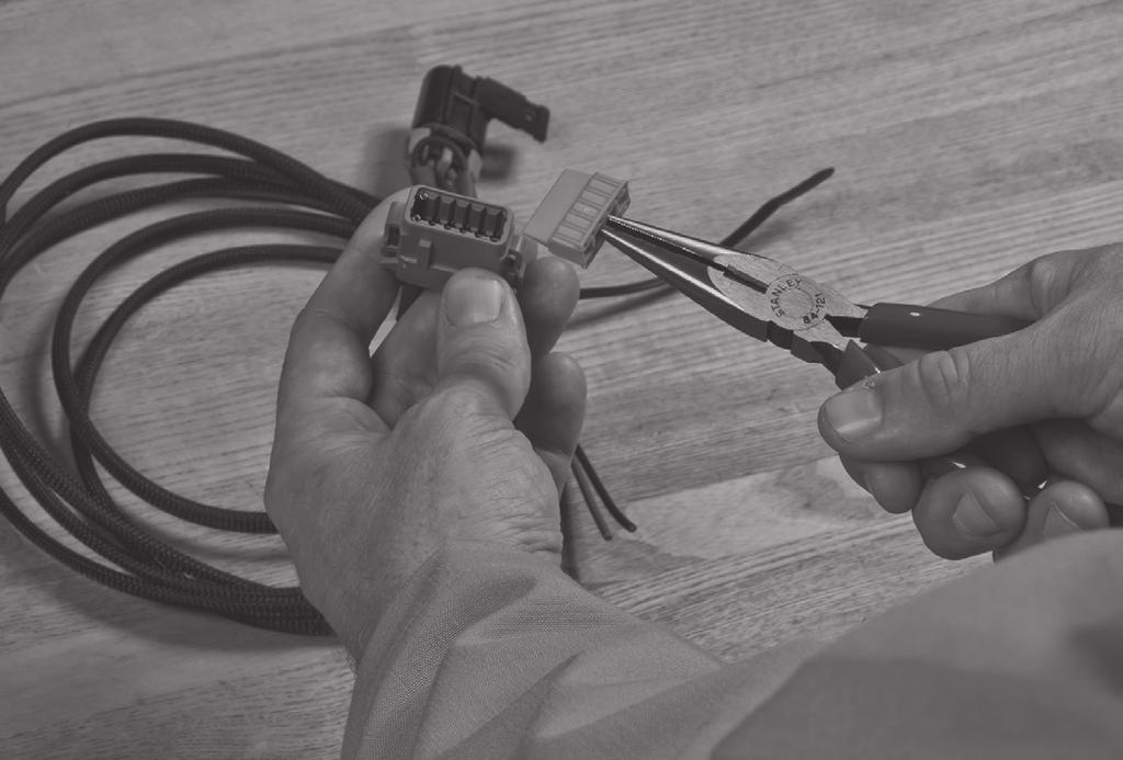 If cutting to length, two (2) additional Deutsch connectors are provided with each cable assembly and must be attached to the trimmed cable wires utilizing a Deutsch crimp tool.