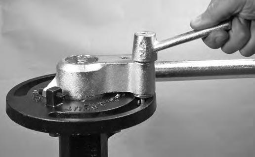 Install the memory pointer (Item 15) onto the carriage bolt. Make sure the memory pointer and the pointer of the handle hub are aligned. 2b.