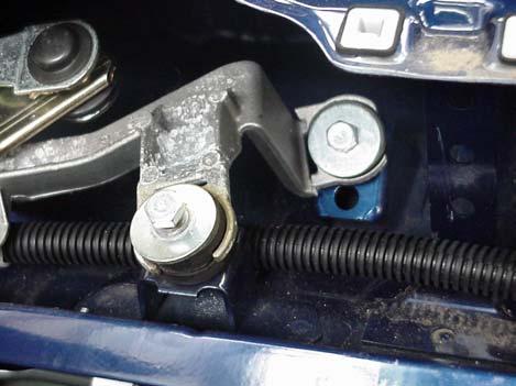 in the windscreen scuttle area is the potential for contact with the wiper mechanism. At present the wiper mechanism operates from rigid linkages to the two spindles.