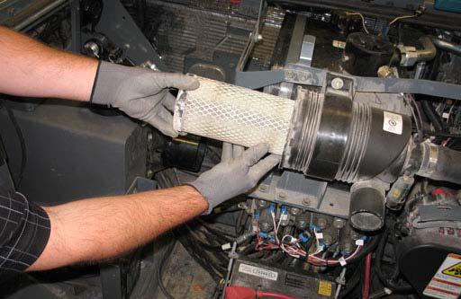 The engine must be running to get an accurate air indicator reading. Remove the filter element.