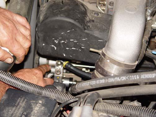 STEP 4: Installing Fuel Line: Use the following photo s to complete this step: Photo 4A Photo 4B 1.