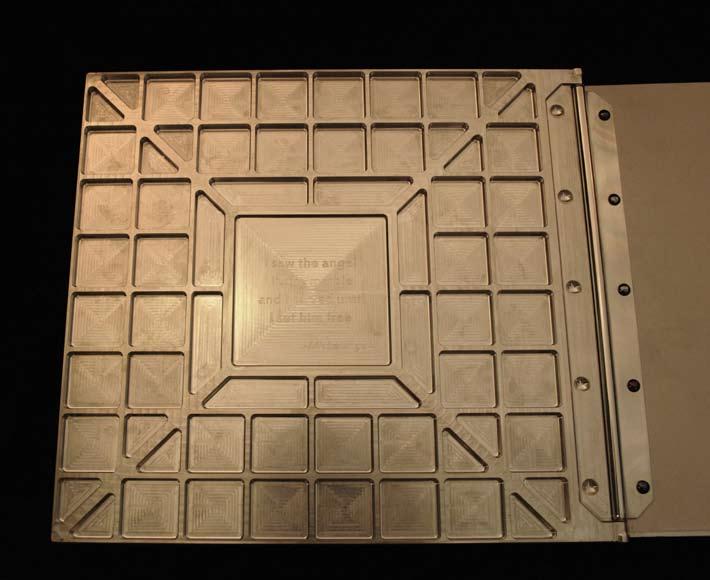 Michelangelo s famous quote alludes to man s creativity. The front, inside cover of the book is CNC milled to look like the machine work on the chassis.
