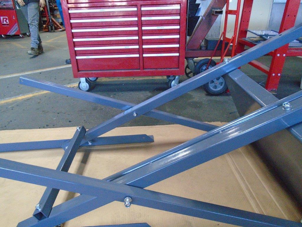 3. Bolt the base frame support bars to the vertical support bars.