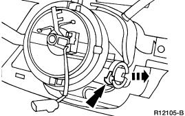 10. Disconnect the air bag sliding contact electrical connector and separate the air bag electrical connector from