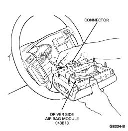 1997 Aerostar/Ranger 3. Disconnect the electrical connector on driver side air bag module from connector on air bag sliding contact (14A664). 4.
