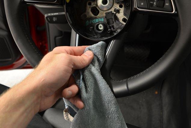 INSTALLING THE CF STEERING WHEEL TRIM Step 1: Prep the original steering wheel trim by