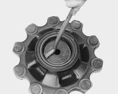 Remove the two socket button head screws using 5mm A/F Allen key (Fig. 2). The hub locknut should be removed using hub nut spanner (Meritor part number 21224839). FIG. 3 3.