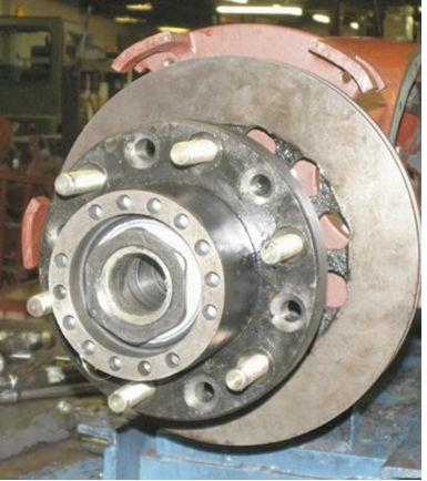 Page 23 of 31 Pages a Figure 22, Installing Inner Bearing Nut a. Thread the inner 02025-0051 (5) Wheel Bearing Nut onto the end of the axle arm. Important: Be careful not to cross-thread this nut.