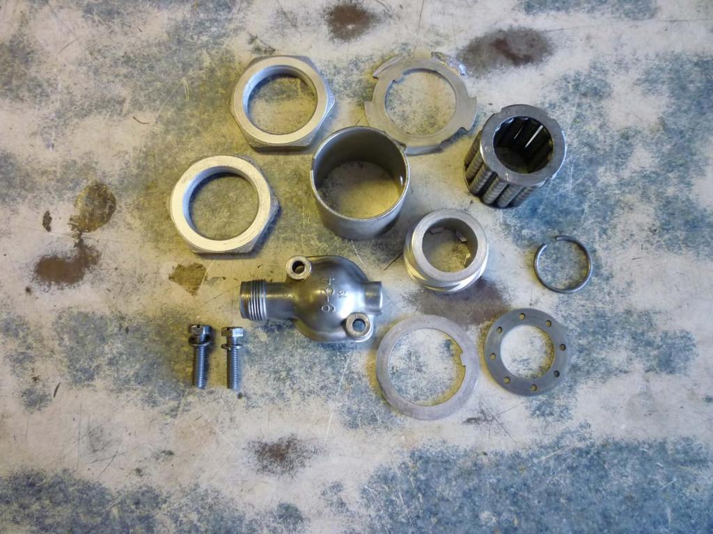 The miscellaneous hardware for the front of the torque tube has been cleaned and bead blasted along with the hardware for the pinion gear sleeve.