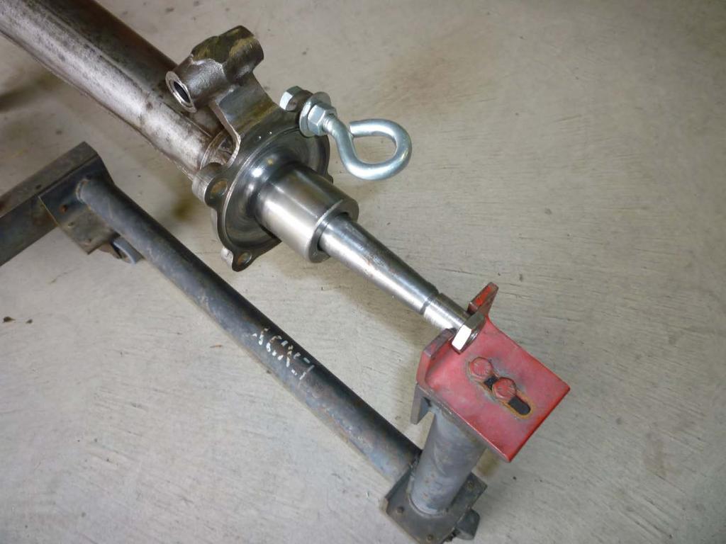 This photo shows the threaded sleeve installed on the threaded end of the axle to protect the