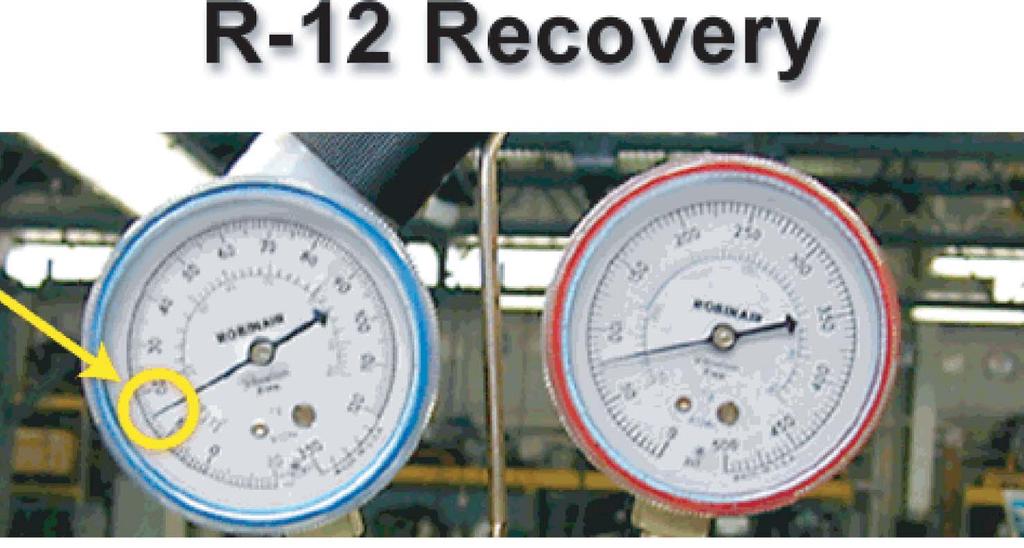 Connect the recovery unit to the vehicle. Drain the oil from the recovery cart before beginning the recovery process.