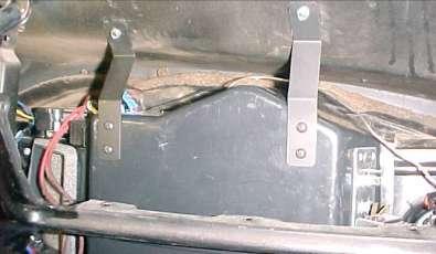 Holding evaporator level with bottom of glove box opening attach to body of the car using (2) tek screws.