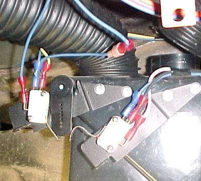 Locate ground wire from the actuator harness and attach to the brace as shown. use (1) #10 tek screw.