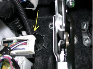 13. From inside the cabin, locate the wires that were pushed through in step 2.