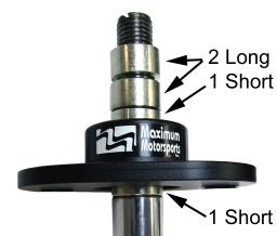 Use the guidelines below to determine the correct combination of spacers to put above and below the spherical bearing. Use the same spacer configuration on each side of the car.