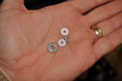 9) Use 1 screw, 2 nylon washers, and 1 metal washer