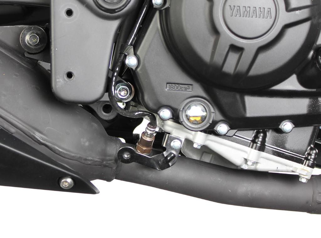 and carefully remove the stock exhaust system off the motorcycle