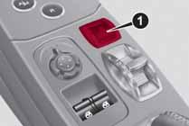 IN AN EMERGENCY HAZARD WARNING LIGHTS OPERATION Press switch 1 fig. 54 to turn the lights on/off. 54 Warning lights Ÿ and Δ on the panel are lit up when the hazard warning lights are on.