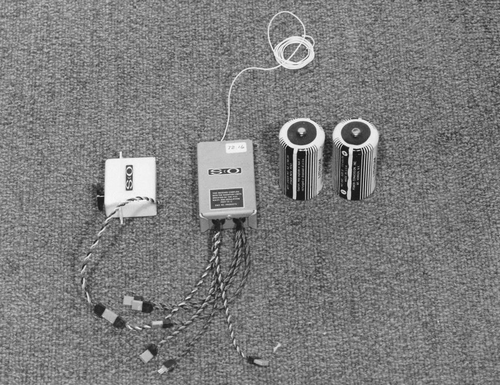 Airborne Radio Control Components Shown above left to right are: one of the servo actuators, the S&O radio receiver, and the two Lithium primary batteries that power the radio control and telemetry