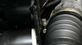 93. Check the orientation of the clamps which secure the rubber rack bellows boots to the rack housing.