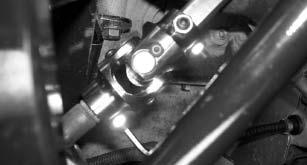 Thread the nut on a few turns. 94. Torque the steering rack mounting bolts to 55 ft-lbs. 95. Reinstall the steering shaft pinch bolt. 96.