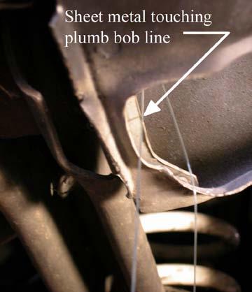 48. Wait for the plumb bob to stop swinging.
