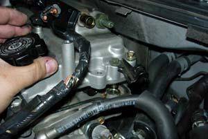 Step 6 Exhaust Manifold Removal (cont.): Step 6-E: Remove valve cover.
