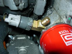 Step 8-M: Remove the oil pressure sender from the oil filter