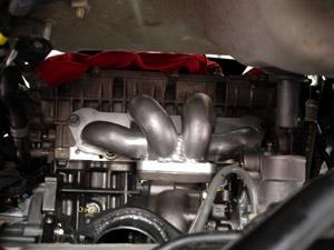 Step 9 Turbo Installation: Step 9-A: Swing the bottom of the engine forward, make sure the Exhaust