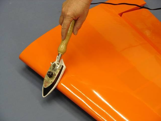 CHECKING SEAMS AND COLOR OVERLAPS FOR GOOD SEAL SEALING HINGE GAPS 1. Go over all seams and color overlaps with your sealing iron.