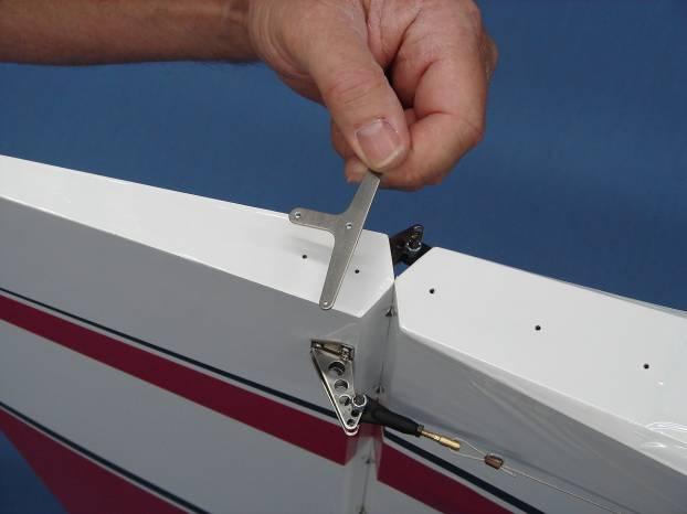shown. This ensures the rudder is straight when the tail wheel steering springs are installed. 3.