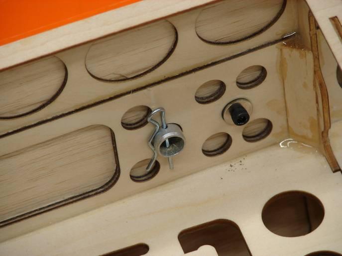 Slide the rubber backed washers on the wing mounting bolts and insert bolts through the fuse side and into the wing root blind nuts.